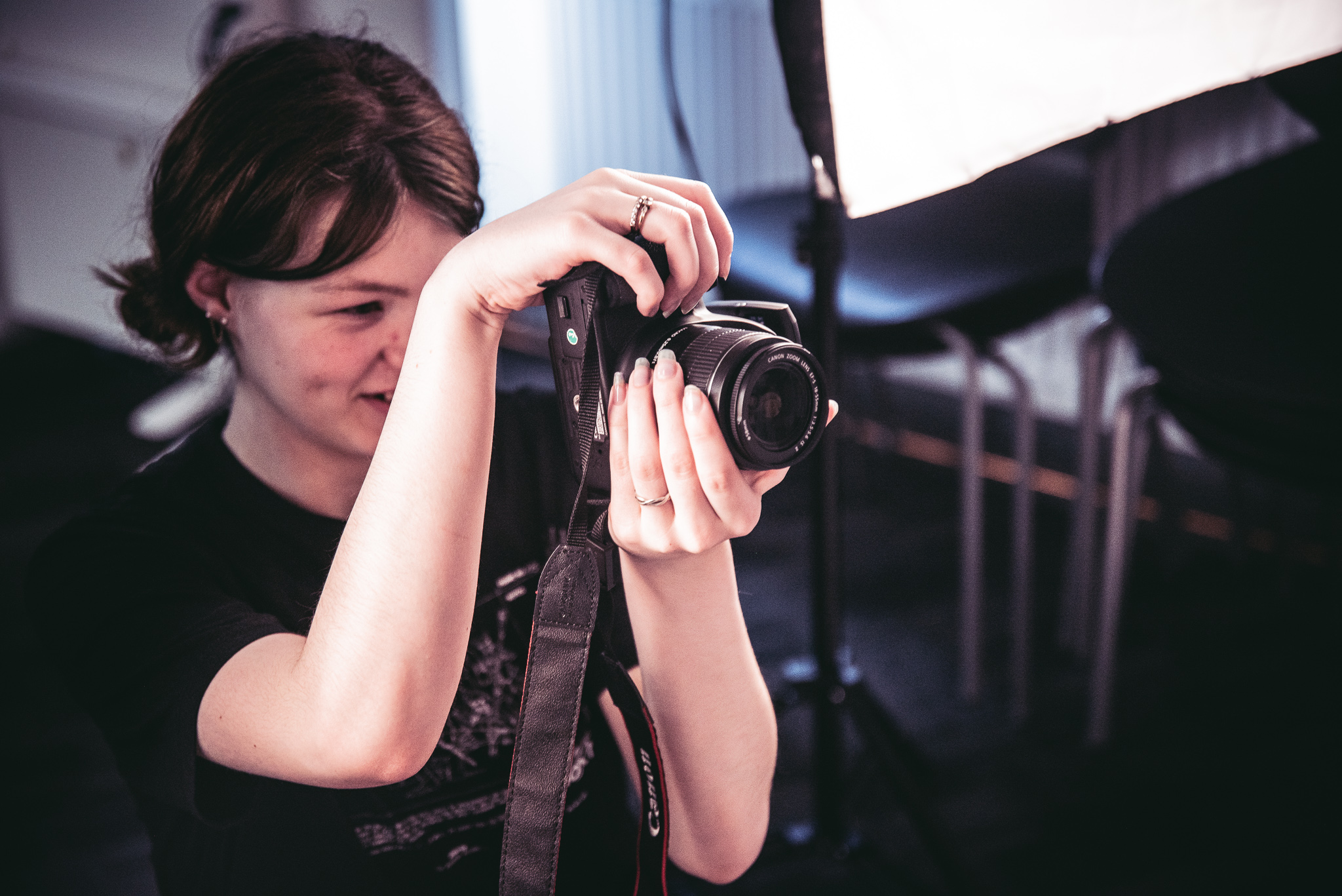 Woman taking picture on professional camera