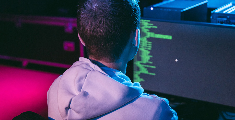 a student looking at a computer