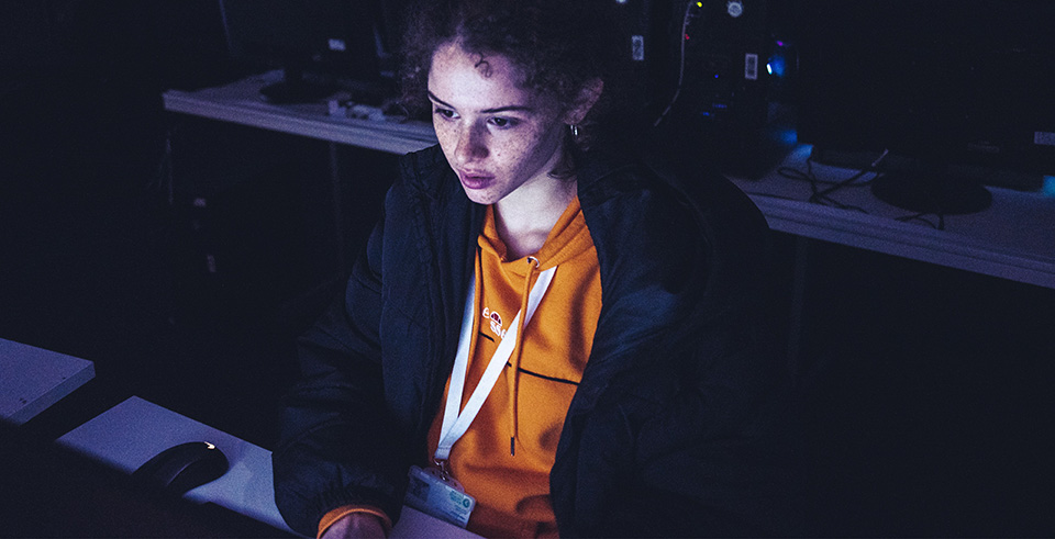 a student looking at a computer