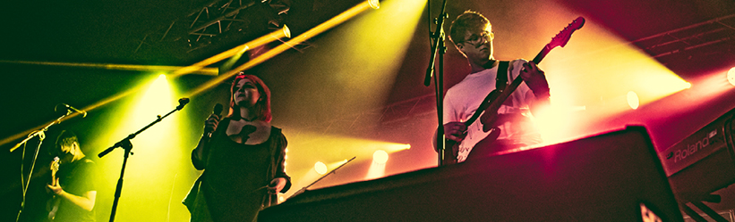 A band performing on stage