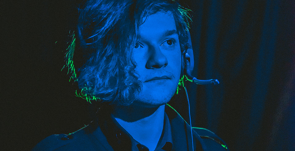A male wearing a headset