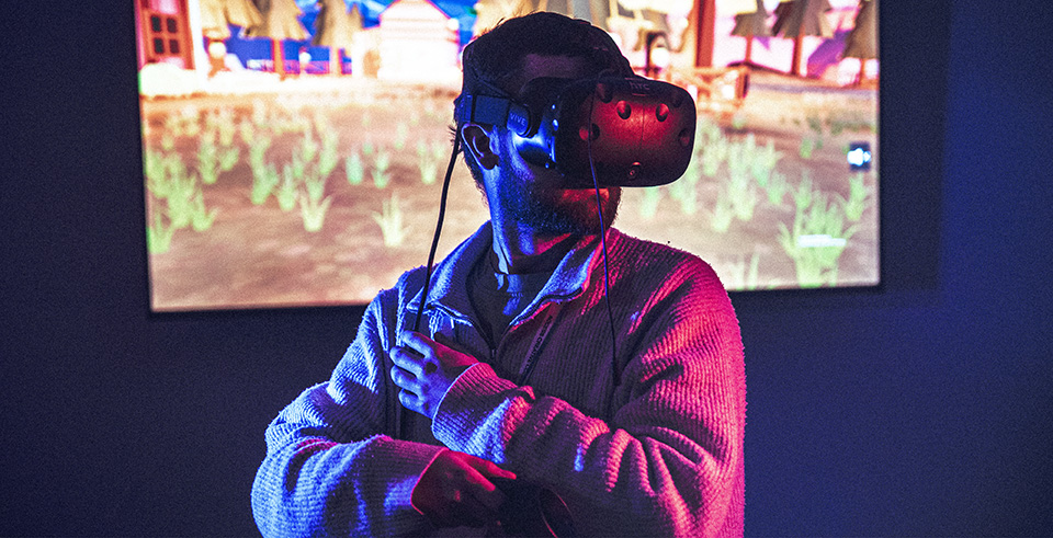 A male wearing a VR headset