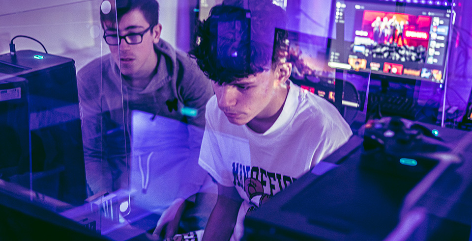 Two males working at a computer