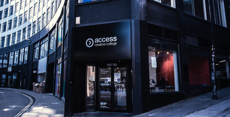 An image of ACC Bristol, black fronted building with a glass door