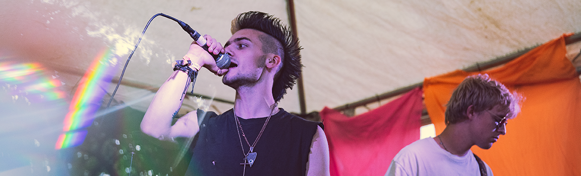 Two males performing on stage