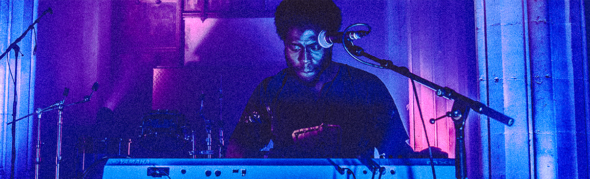 A male performing on stage