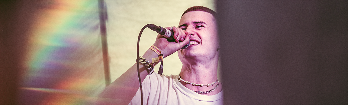 A male performing on stage