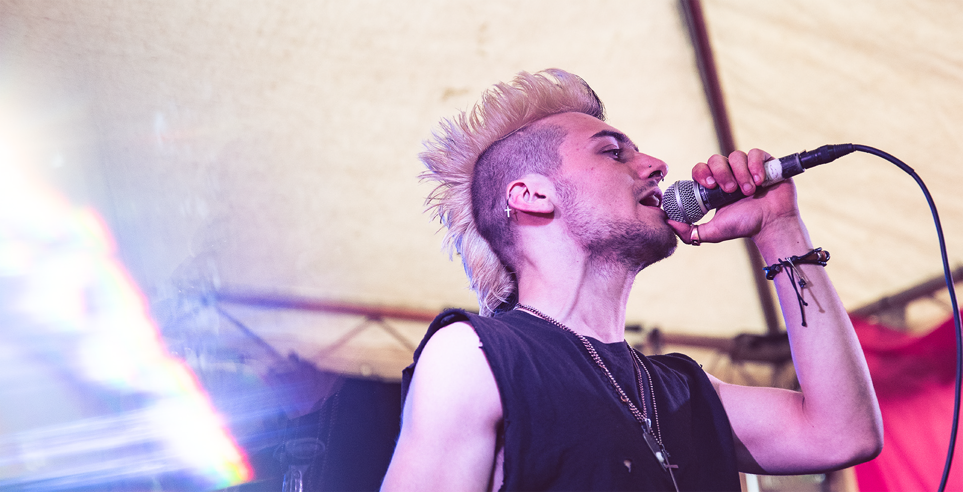 A male performing on stage