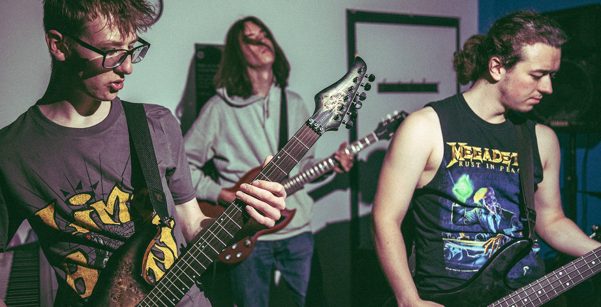A group of males playing music together