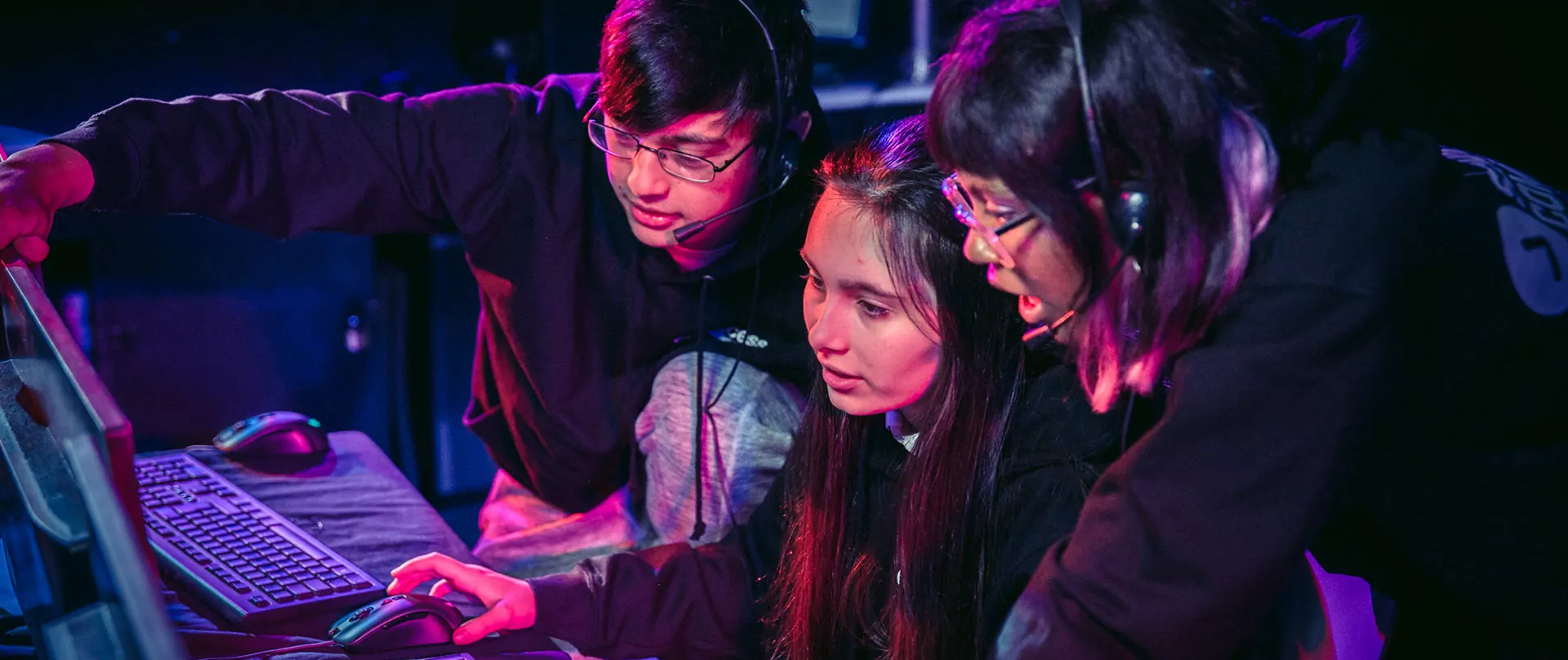 A group of people competing in esports