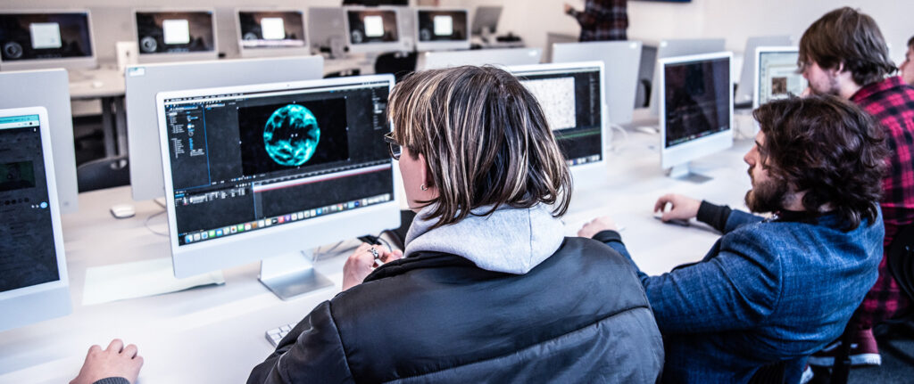 How to start a career in VFX: Skills you need at 16 2 A group of people working on computers