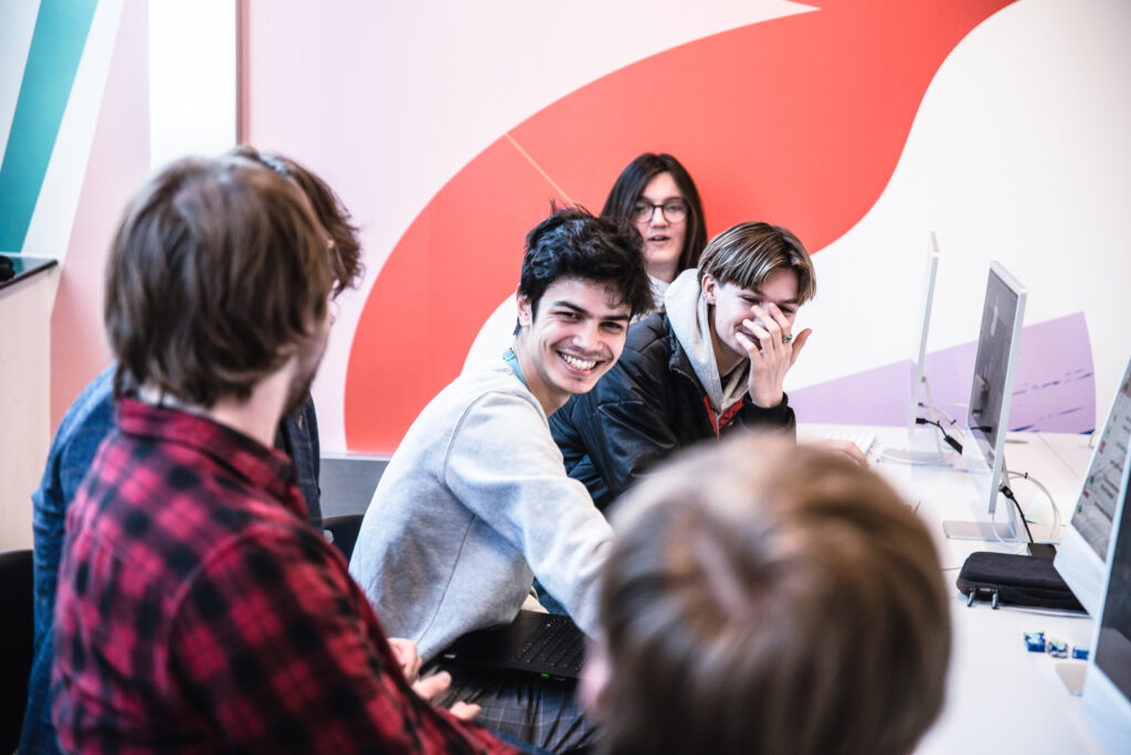 College students laughing with each other