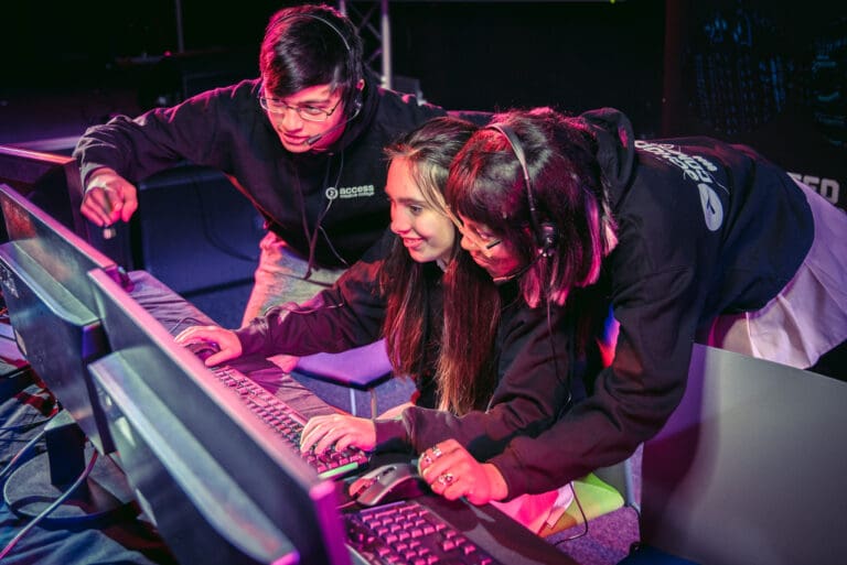 Young college students in esports class working together
