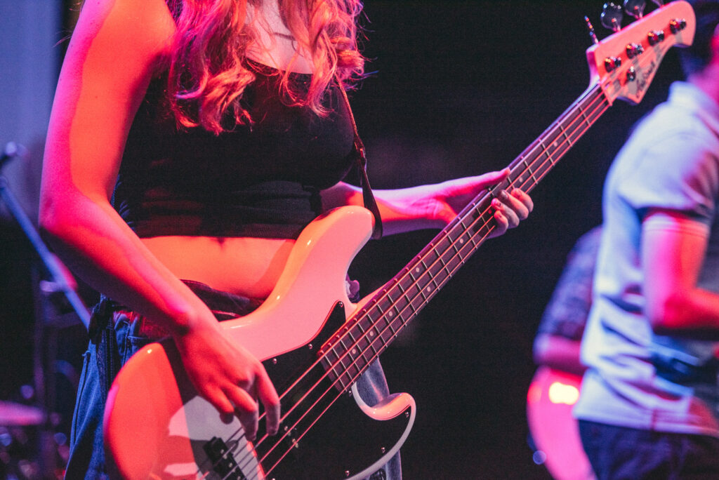 Female student playing guitar