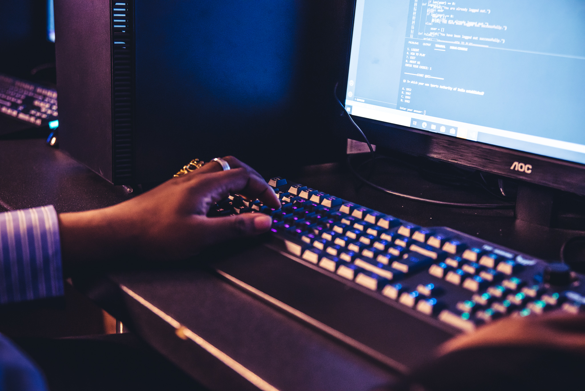 Man typing on computer