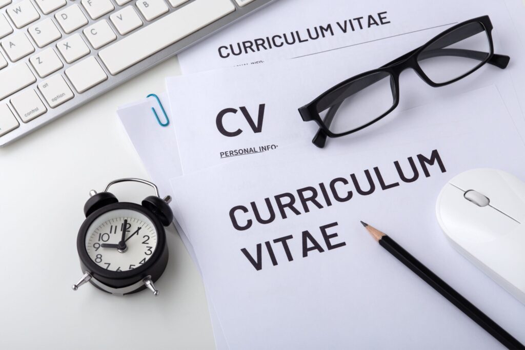 How to start a graphic design career in Birmingham 4 CV on an employer's desk