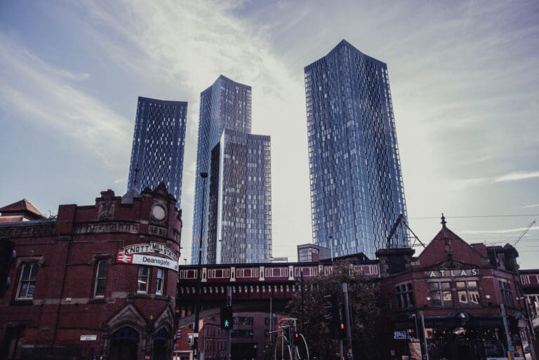 Manchester city centre skyline behind Deansgate station