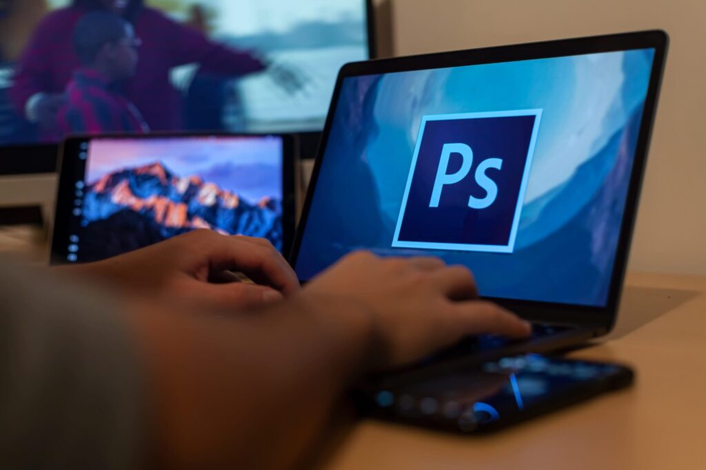 Photoshop vs GIMP: Which is better in 2025? 2 Photoshop on student's laptop