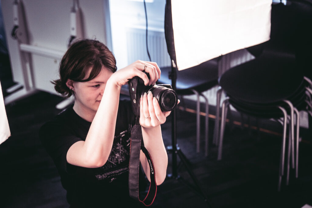 Female Lincoln photographer in action