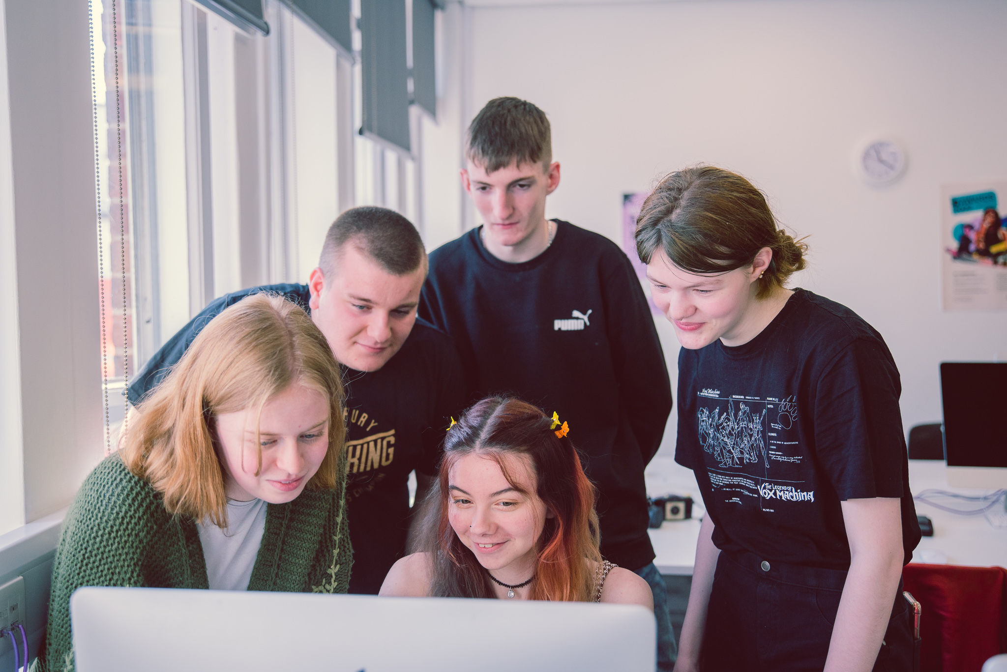 Level 2 college students working together