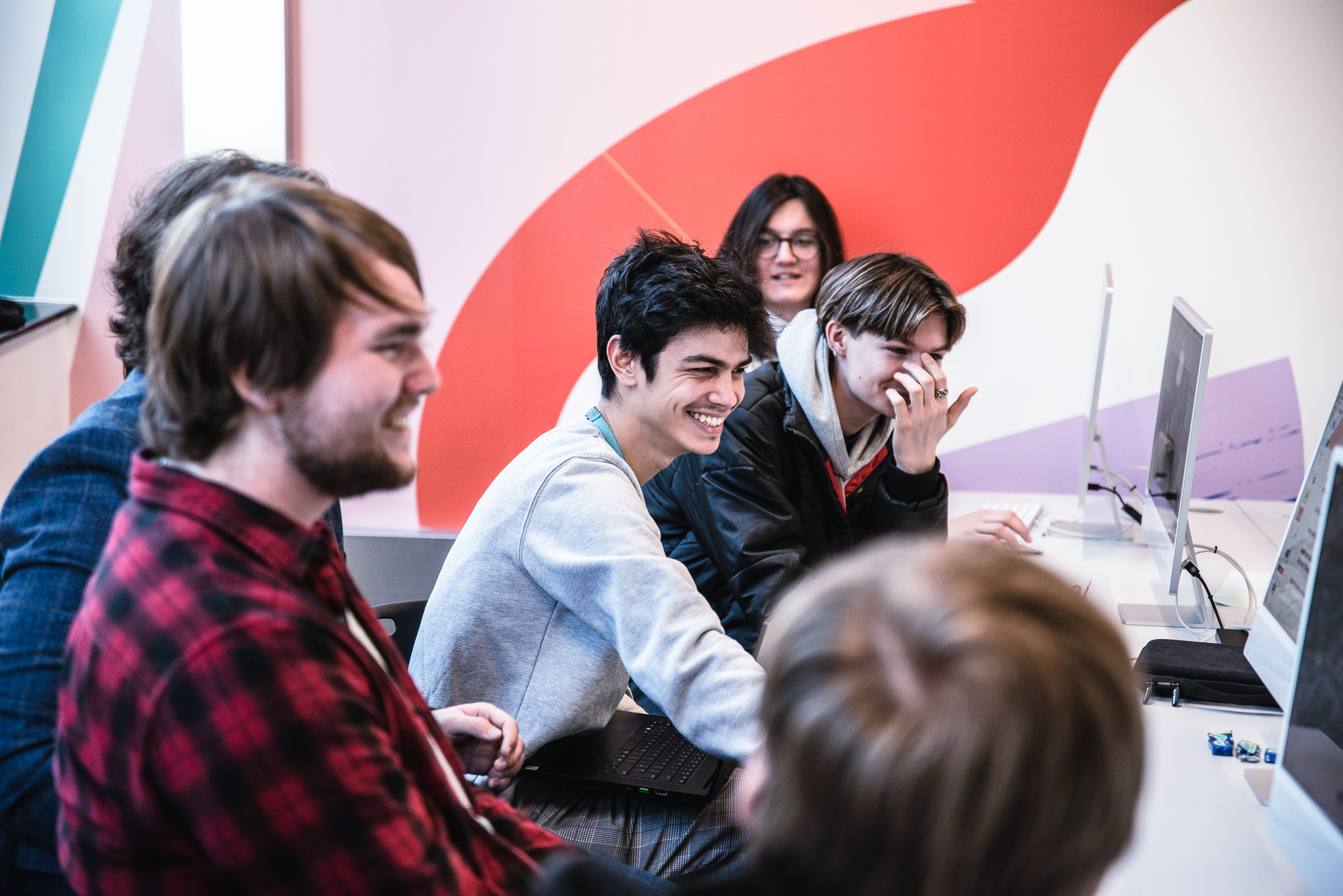 5 reasons you may want to study a Level 2 course 2 Level 2 students having fun while studying