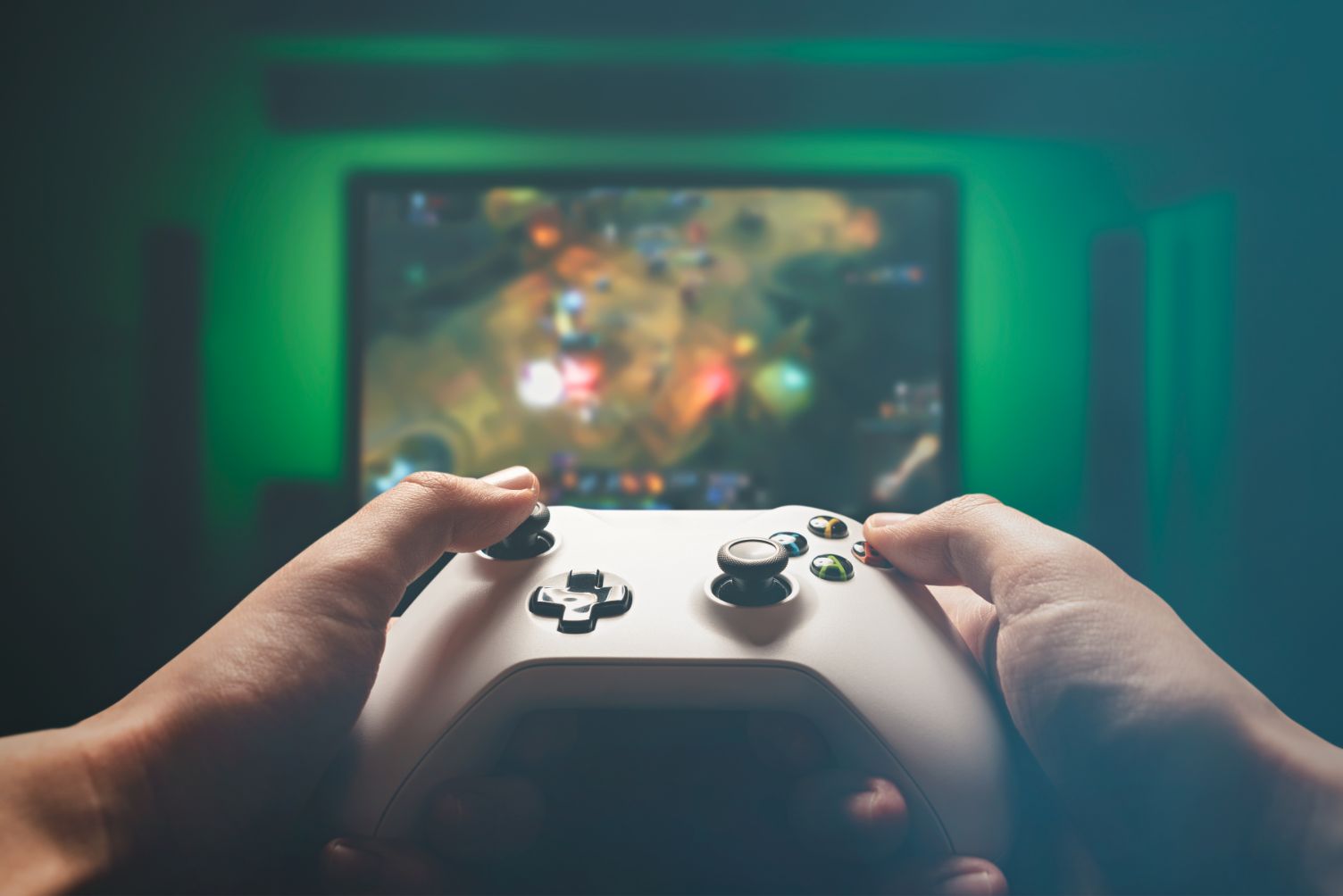 Man playing video games on his Xbox