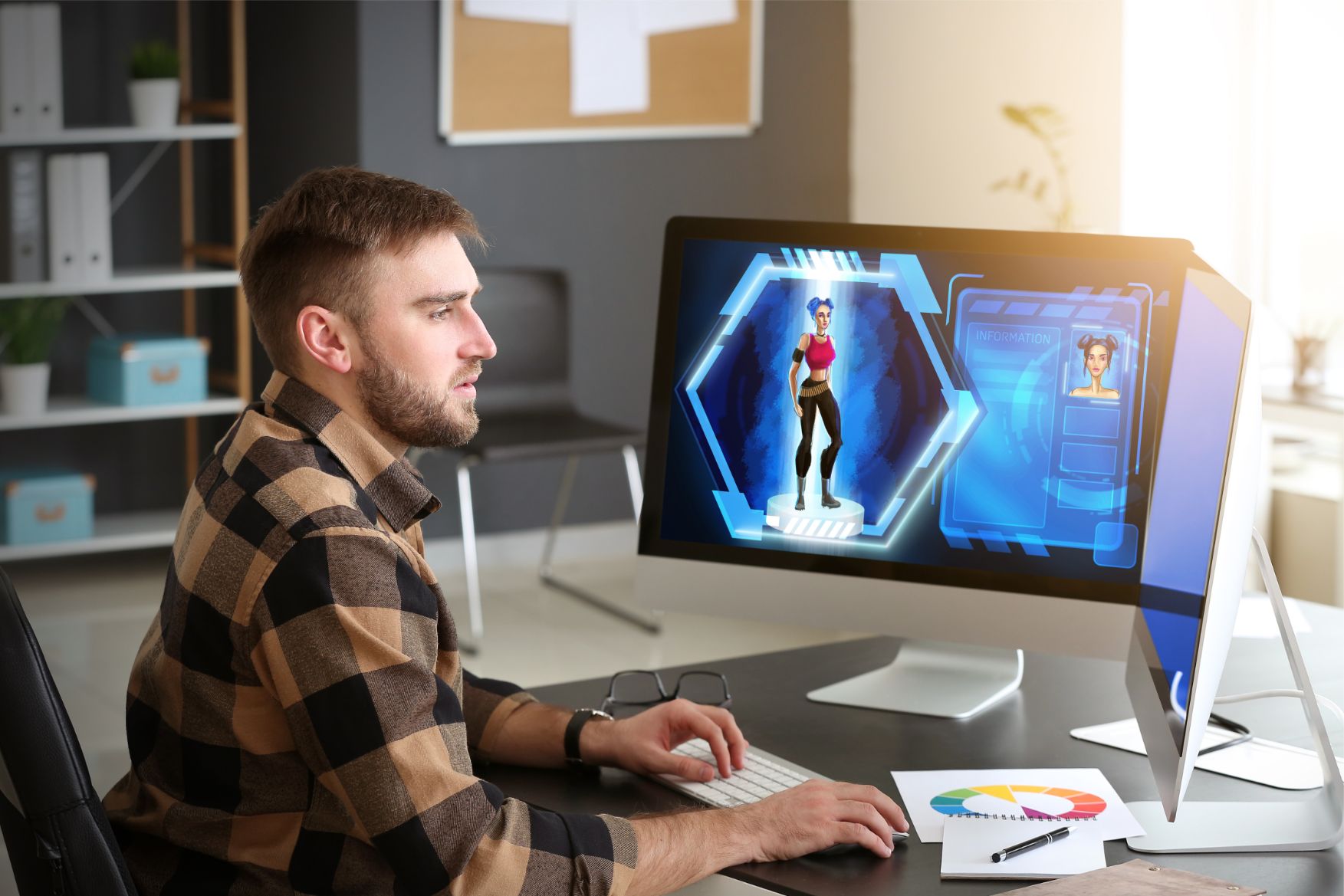 Graphic Design and Game Design: What's the difference? 2 Man designing a character for game on computer