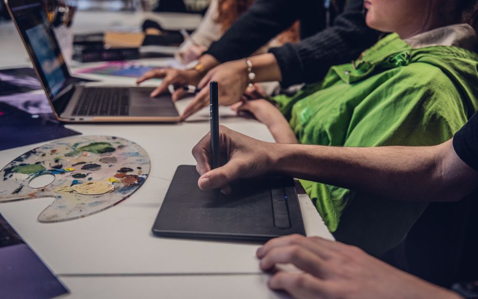 What skills do you need as a content creator? 7 Content Creation student on graphics tablet