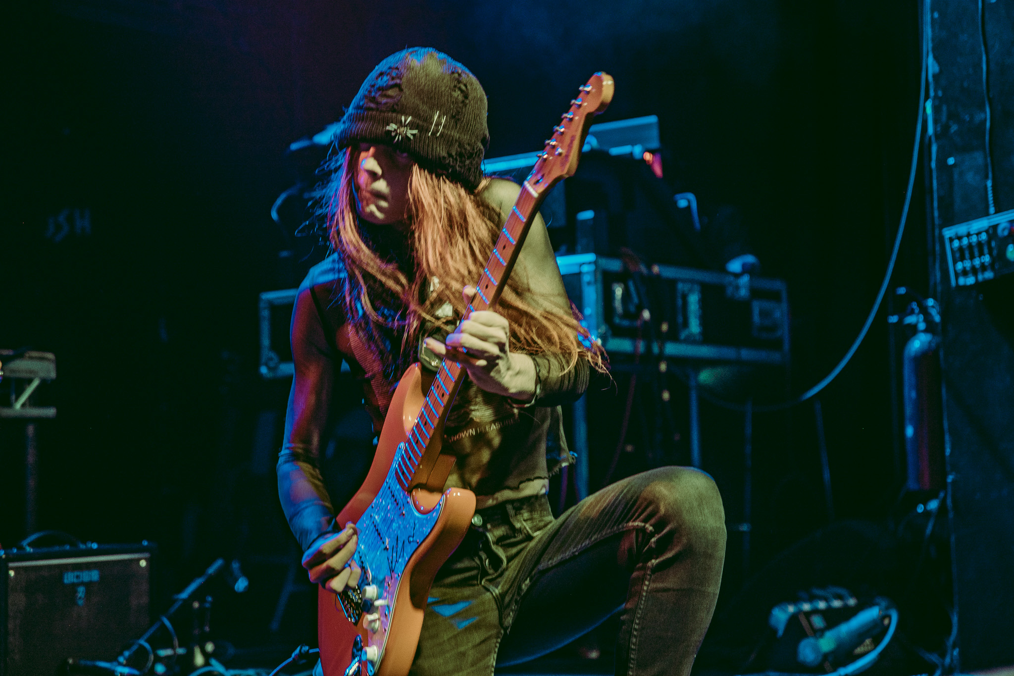 Overcoming Stage Fright: 10 Tips for Confident Live Performances 4 Guitarist performing on stage in Manchester