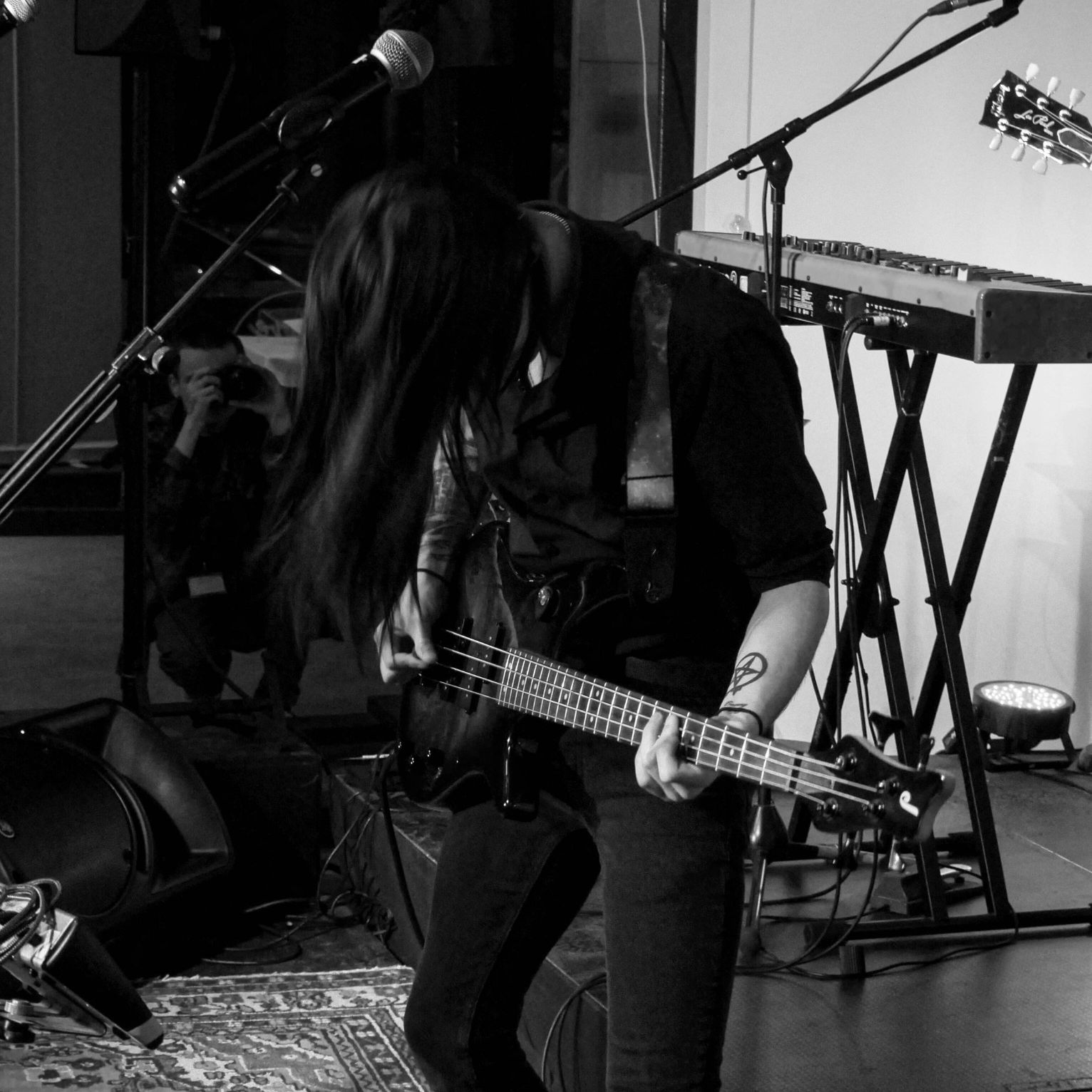 Connor Dawson - Level 2 Music Award Winner 2024 1 Connor Dawson from Level 2 Music playing guitar in black and white