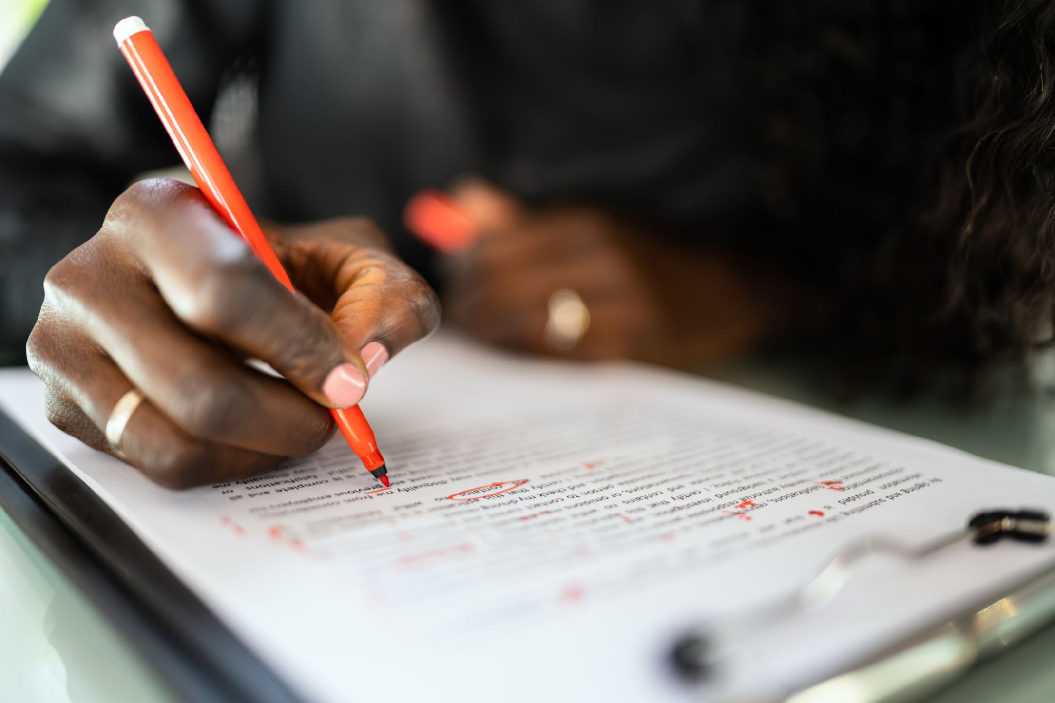 Crafting Your First CV: A Step-by-Step Guide for College Students 11 Woman correcting mistakes on CV