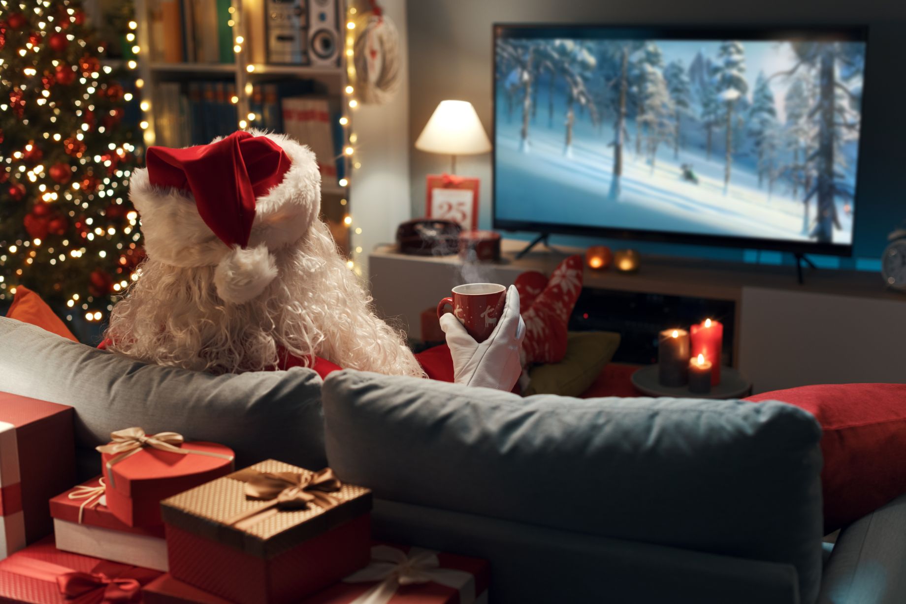 Santa watching a Christmas film