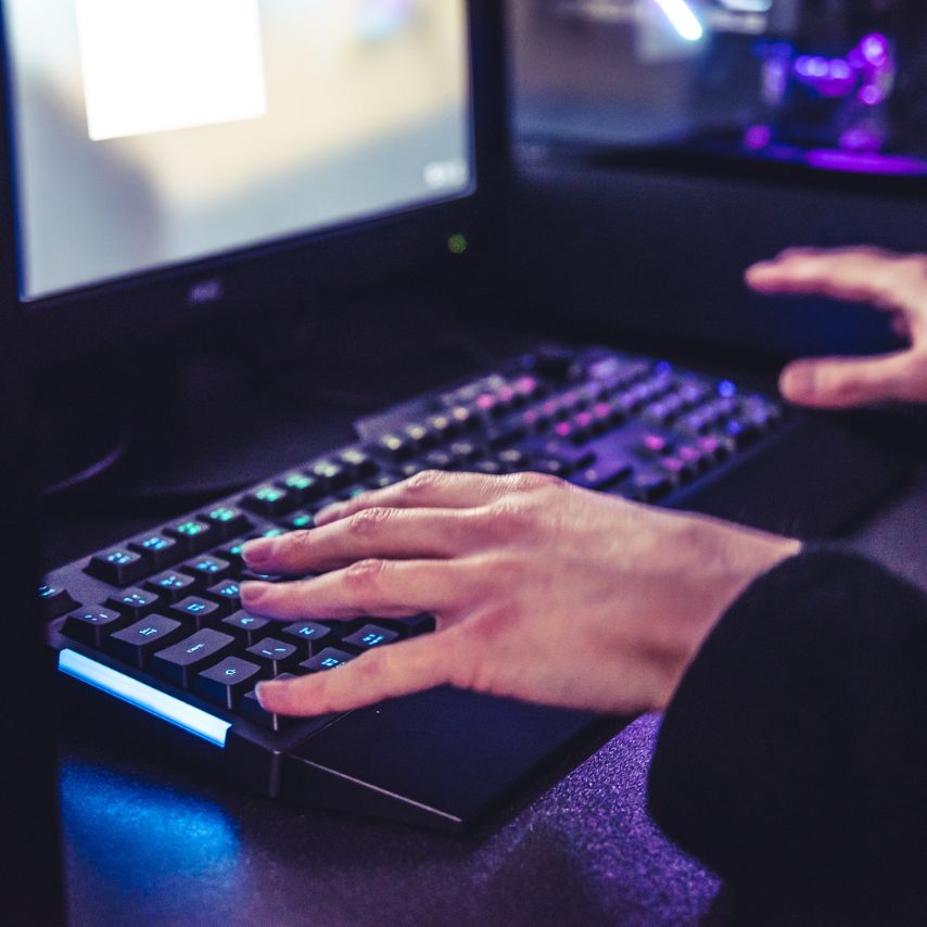 IT Technician working on keyboard