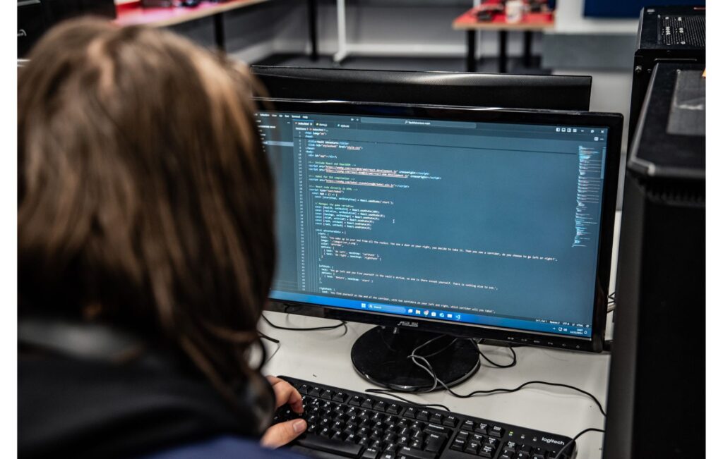 T Level Software Development student working on computer
