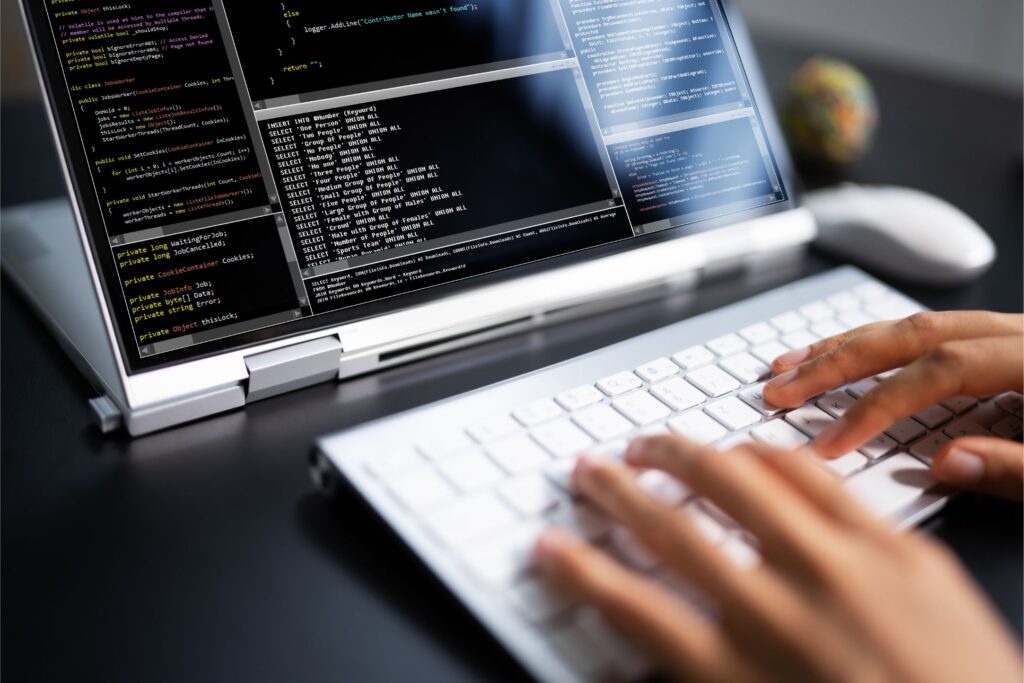 Web Developers vs Software Developers: What’s the difference in 2025? 1 Web developer coding on computer