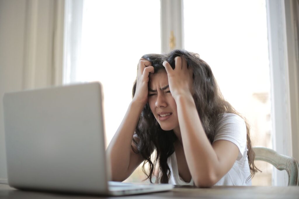 How to deal with assignment stress 1 Female student suffering from stress