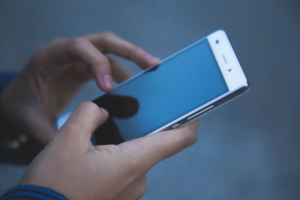 A guide to the best free Mental Health apps in 2025 4 Person using smartphone
