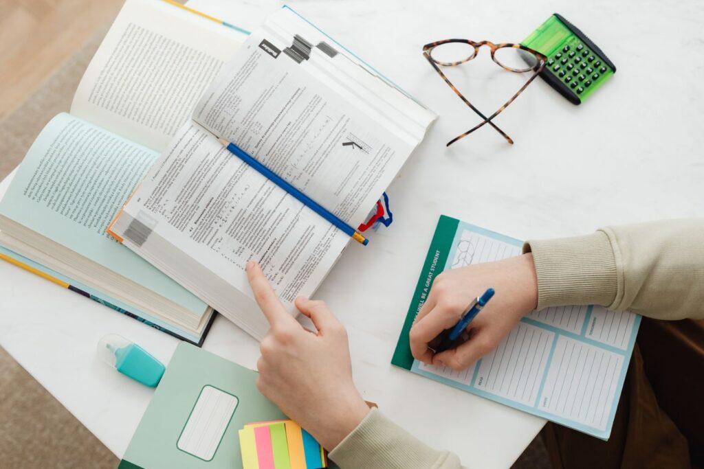 How to prepare for your GCSEs 5 Student revising with Maths book
