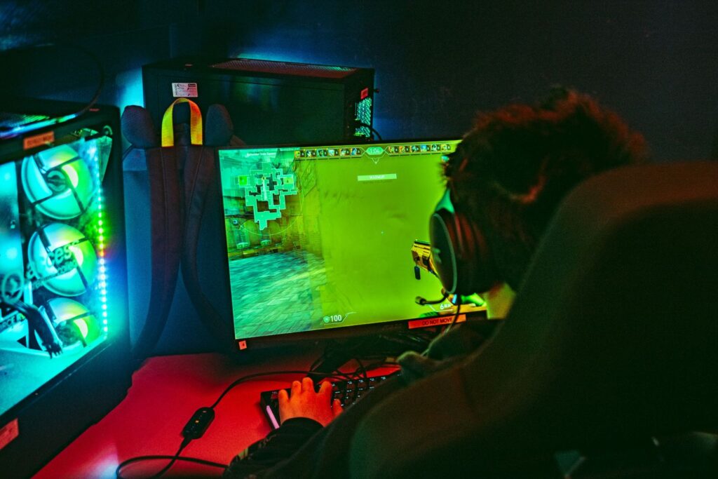 Gaming students on computer together